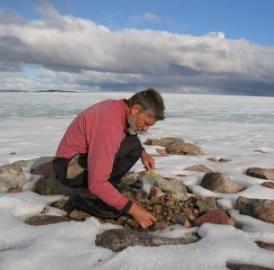 University of Colorado Boulder Professor Gifford Miller is shown here collecting dead plant samples from beneath a Baffin Island ice cap. A new study led by Miller indicates the Little Ice Age began roughly A.D. 1275 and was triggered repeated, explosive volcanism that cooled the atmosphere. University of Colorado Boulder Professor Gifford Miller is shown here collecting dead plant samples from beneath a Baffin Island ice cap. A new study led by Miller indicates the Little Ice Age began roughly A.D. 1275 and was triggered repeated, explosive volcanism that cooled the atmosphere.