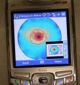 Demonstrating the feasibility of using cell phone technology for medical imaging, the cell phone image seen here is a simulated breast tumor, shown in red. Demonstrating the feasibility of using cell phone technology for medical imaging, the cell phone image seen here is a simulated breast tumor, shown in red.