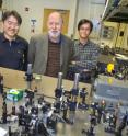 Graham Fleming (center) shown here with Tae Ahn (left) and Yuan-Chung Cheng, post-doctoral researchers in his group, were among the co-authors of a paper in the journal Science that provided the first detailed picture ever obtained of the molecular mechanism behind the regulation of light harvesting energy during photosynthesis. Graham Fleming (center) shown here with Tae Ahn (left) and Yuan-Chung Cheng, post-doctoral researchers in his group, were among the co-authors of a paper in the journal Science that provided the first detailed picture ever obtained of the molecular mechanism behind the regulation of light harvesting energy during photosynthesis.