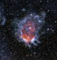 Color composite image of RCW120. It reveals how an expanding bubble of ionized gas about ten light-years across is causing the surrounding material to collapse into dense clumps where new stars are then formed. The submillimeter-wavelength data were taken with the LABOCA camera on the 12-m Atacama Pathfinder Experiment (APEX) telescope. Here, the submillimeter emission is shown as the blue clouds surrounding the reddish glow of the ionized gas (shown with data from the SuperCosmos H-alpha survey). The image also contains data from the Second Generation Digitized Sky Survey (I-band shown in blue, R-band shown in red).