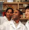 UCF Associate Professor James Turkson works in his lab with two graduate students. UCF Associate Professor James Turkson works in his lab with two graduate students.
