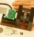 Researchers led by Stanford professor Shan Wang have built a handheld device that finds event faint signs of cancer in a blood sample. Researchers led by Stanford professor Shan Wang have built a handheld device that finds event faint signs of cancer in a blood sample.