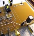 An in-progress demonstration board of an energy-harvesting radio developed at Kansas State University. The finished board includes solar cells to power the radio. An in-progress demonstration board of an energy-harvesting radio developed at Kansas State University. The finished board includes solar cells to power the radio.