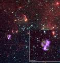 The main graphic shows the area around SNR 0104 in infrared light from Spitzer (red and green) and X-rays from Chandra (purple). The inset shows a close-up of SNR 0104. The main graphic shows the area around SNR 0104 in infrared light from Spitzer (red and green) and X-rays from Chandra (purple). The inset shows a close-up of SNR 0104.