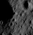 This full resolution detail is from one of the first images taken by a Narrow Angle Camera, part of the Lunar Reconnaissance Orbiter Camera imaging system. At this scale and lighting, impact craters dominate the landscape. Visible are two general types of impact craters: Solitary craters which most likely represent a single impact event, and clusters or chains of small, fresh craters produced by the impact of lunar material excavated by a larger impact. Image width is 1,400 meters (0.87 miles), north is down. This full resolution detail is from one of the first images taken by a Narrow Angle Camera, part of the Lunar Reconnaissance Orbiter Camera imaging system. At this scale and lighting, impact craters dominate the landscape. Visible are two general types of impact craters: Solitary craters which most likely represent a single impact event, and clusters or chains of small, fresh craters produced by the impact of lunar material excavated by a larger impact. Image width is 1,400 meters (0.87 miles), north is down.