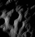 This full resolution detail is from one of the first images taken by a Narrow Angle Camera, part of the Lunar Reconnaissance
Orbiter Camera imaging system. Visible are distinctive trending lineations, which are probably remnants of a
catastrophic deposition of ejecta from a nearby impact. Older craters are subdued, while younger craters are crisp and sharp. Image width is 1,400 meters (0.87 miles), north is down. This full resolution detail is from one of the first images taken by a Narrow Angle Camera, part of the Lunar Reconnaissance
Orbiter Camera imaging system. Visible are distinctive trending lineations, which are probably remnants of a
catastrophic deposition of ejecta from a nearby impact. Older craters are subdued, while younger craters are crisp and sharp. Image width is 1,400 meters (0.87 miles), north is down.