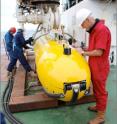 The Autosub6000 is being readied for launch. Note the collision avoidance sonar and fenders mounted on the nose of the AUV. The Autosub6000 is being readied for launch. Note the collision avoidance sonar and fenders mounted on the nose of the AUV.