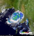 This TRMM rainfall rate image captured on Oct. 21 at 1534 UTC (11:34 a.m. EDT) shows moderate to heavy rain showers were surrounding Cyclone Giri's partially-formed eye. Red indicates heavy rainfall at more than 2 inches per hour. The yellow and green areas indicate moderate rainfall between .78 to 1.57 inches per hour.