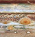 Hubble Space Telescope close-up of three red ovals on Jupiter, the smallest of which (3,000 miles in diameter) is new and may merge with the Great Red Spot (10,000 miles in diameter) in August. Red Spot Jr. is the medium-sized red oval, about 5,000 miles across.