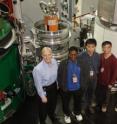 Part of the team that determined the magnetic and crystal structure of the new iron-based superconductor with the NIST Center for Neutron Research instrument they used for the experiment. Pictured from left are Jeffrey Lynn (NIST), William Ratcliff II (NIST), Pengcheng Dai (University of Tennessee Knoxville/Oak Ridge National Laboratory), Qing Huang (NIST) and Clarina de la Cruz (University of Tennessee Knoxville).