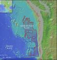 Deep-sea basalt region for CO2 burial. Red outline shows where water depth exceeds 2,700 meters and sediment thickness exceeds 200 meters; hatched areas show where sediment thickness exceeds 300 meters. Seamounts and areas near plate boundaries or continental shelf are excluded.