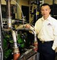 Song-Charng Kong, an Iowa State University assistant professor of mechanical engineering, and his students are studying engines in an effort to reduce emissions and improve efficiency.