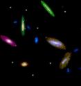 The picture shows the 14 galaxies studied at the Wise Observatory. The galaxies stretch along a line from the lower-right to the top-left corner of the image. The star-forming regions are highlighted as shining reddish points.