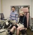 Researcher Dain LaRoche, assistant professor of exercise science at UNH, works with Jean Haigh.