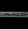 A turbulent eddy flowing through a thin glass pipe. The flow is laminar in front of and behind the eddy.