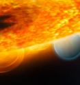 This is an artist's impression of the Jupiter-size extrasolar planet, HD 189733b, being eclipsed by its parent star. Astronomers using the Hubble Space Telescope have measured carbon dioxide and carbon monoxide in the planet's atmosphere. The planet is a "hot Jupiter," which is so close to its parent star that it completes an orbit in only 2.2 days.

This type of observation is best done when the planet's orbit carries it behind the star (as seen from Earth), which allows an opportunity to subtract the light of the star alone (when the planet is blocked) from that of the star and planet together prior to eclipse. This allows astronomers to isolate the infrared emission of the planet and make spectroscopic observations that chemically analyZe the day side atmosphere.

The planet is too hot for life, as we know it. But under the right conditions, on a more Earth-like world, carbon dioxide can indicate the presence of extraterrestrial life. This observation demonstrates that chemical biotracers can be detected by space telescope observations.