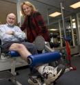 Lynn Snyder-Mackler, Ph.D promotes quadriceps exercise after knee replacement surgery.  She's joined by patient T. Fraser Russell, who says after two months of rehab, he saw vast improvements.