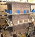 Researchers built an entire three-story building inside Purdue's Robert L. and Terry L. Bowen Laboratory for Large-Scale Civil Engineering Research to test the effectiveness of a simple, inexpensive method to strengthen buildings and reduce their vulnerability to earthquakes. The reinforced-concrete structure was subjected to forces simulating the effects of a strong earthquake by pulling and pushing the building with six powerful hydraulic "actuators."