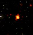 GRB 080916C's X-ray afterglow appears orange and yellow in this view that merges images from Swift's UltraViolet/Optical and X-ray telescopes.