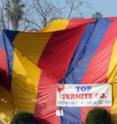 A residential property subject to tent fumigation or "tenting," a process in which the property is sealed over with a canvas and filled with a pesticide gas for a number of days in order to kill pests such as termites and cockroaches. Los Angeles, California.