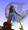 A software program simulates assembly processes: virtual robots weld a virtual car body.