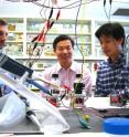 This photo shows Bruce E. Logan, Shaoan Cheng and Defeng Xing with a microbial cell that produces methane directly from electricity.