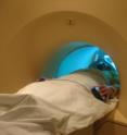 A subject performs a routine task in an fMRI brain scanner.