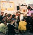 A nurse in a Jerusalem classroom is teaching children about handwashing.