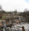 Ruins of two homes in the Trails community burned during the Witch and Guejito fires in 2007. To reduce structure loses from future Wildland Urban Interface fires, NIST has reconstructed a timeline of the fire events, including the defensive actions taken by first responders and homeowners.