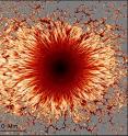 The interface between a sunspot's central and outer regions shows a complex structure. The interface between a sunspot's central and outer regions shows a complex structure.