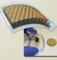 A flexible solar cell is achieved by removing the aluminum substrate, substituting an indium bottom electrode, and embedding the 3-D array in clear plastic.