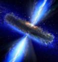 This artist's concept shows the core of an active galaxy, where a feeding supermassive black hole drives oppositely directed particle jets.