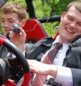 Wesley Majerus, an access technology specialist with the National Federation of the Blind’s Jernigan Institute, finishes driving the Virginia Tech Blind Driver Challenge vehicle around a roped-off driving course on a campus parking lot. The experience, he said, was liberating.