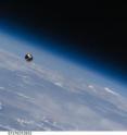 The ANDE-2 spacecraft, Castor and Pollux, shortly after deployment from Space Shuttle Endeavour on July 30, 2009, as photographed by the crew of STS-127 from the flight deck.
