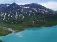 Researchers are examining the sediment from lakes such as Cascade Lake in southwestern Alaska to determine changes in climate through the amount of glacier melting as reflected in the amount of sediment accumulated in the lake each year. Researchers are examining the sediment from lakes such as Cascade Lake in southwestern Alaska to determine changes in climate through the amount of glacier melting as reflected in the amount of sediment accumulated in the lake each year.