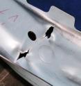 This is damage to a component made out of high-strength steel after a crash test.