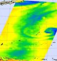 NASA's Aqua satellite AIRS and AMSU instrument data created a microwave image of Choi-Wan on September 13 at 2:11 p.m. EDT. The cold areas in this image (yellow-green) that stretch from right center, left of the small chain of islands, indicate where there is precipitation or ice in the cloud tops. The purple area (far right) has the coldest cloud temperatures to -63F and suggests cloud heights to the 200 millibar level, near the tropopause.