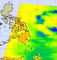 NASA's Aqua satellite data created this microwave image of Parma on Sept. 30 at 12:59 p.m. EDT (16:59 UTC). Cold areas (yellow-green) stretch from Luzon in the northern Philippines south past Mindanano, and indicate precipitation or ice in the cloud tops. The purple area (around the eye) that almost looks like a shoe, has the coldest cloud temperatures to -63F and suggest cloud tops near the tropopause.