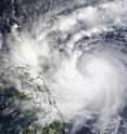 The MODIS instrument on NASA's Terra satellite captured an image of Typhoon Parma on Oct. 1 at 2:25 UTC (10:25 a.m. local Asia/Manila Time) approaching the Philippines (left), part of which are already under a part of Parma's clouds.