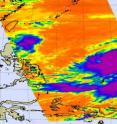 Aqua's Atmospheric Infrared Sounder (AIRS) instrument captured Lupit's (purple and blue) high thunderstorm cloud temperatures at 12:41 a.m. EDT on Oct. 16. The thunderstorm tops were colder than minus 63 Fahrenheit.  The Philippines are visible to the west (left) of Lupit.