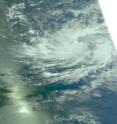 NASA's Aqua satellite captured this visible image of Tropical Storm Neki on October 19 at 00:11 UTC in the Central Pacific Ocean.