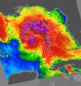 NASA's QuikScat satellite read Ida's sustained wind speeds on Nov. 9 at 11:23 UTC (6:23 a.m.EDT). Ida's sustained winds were near 70 mph. White barbs show direction of wind and point to areas of heavy rain. The highest wind speeds are normally shown in purple, which indicate winds over 46 mph. NASA's QuikScat satellite read Ida's sustained wind speeds on Nov. 9 at 11:23 UTC (6:23 a.m.EDT). Ida's sustained winds were near 70 mph. White barbs show direction of wind and point to areas of heavy rain. The highest wind speeds are normally shown in purple, which indicate winds over 46 mph.
