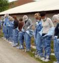 Students in NC State's Veterinary Credential Responder training program suit up in protective equipment for an exercise simulating an outbreak of the H1N5 (Avian) Influenza. The innovative program prepares graduates to protect the health of people as well as animals during natural and man-made disasters.