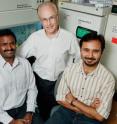 Microbiology professor Steven Blanke (center), graduate student Prashant Jain (left) and postdoctoral researcher Tamilselvam Batcha found that a factor produced by the bacterium <i>H. pylori</i> directly activates an enzyme in host cells that has been associated with several types of cancer, including gastric cancer.