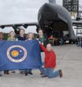 The NASA Team at the Shuttle Landing Facility in Florida poses after GOES-P arrives.
