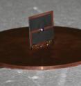 This Z antenna tested at the National Institute of Standards and Technology is smaller than a standard antenna with comparable properties. Its high efficiency is derived from the "Z element" inside the square that acts as a metamaterial, greatly boosting the signal sent over the air. The square is 30 millimeters on a side. This Z antenna tested at the National Institute of Standards and Technology is smaller than a standard antenna with comparable properties. Its high efficiency is derived from the "Z element" inside the square that acts as a metamaterial, greatly boosting the signal sent over the air. The square is 30 millimeters on a side.