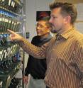 David Traver (right) and Neil Chi used zebrafish, grown in tanks at UCSD, to track blood-forming stem cells.