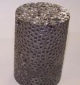 This is composite foam made out of steel spheres and aluminum matrix using casting technique. This is composite foam made out of steel spheres and aluminum matrix using casting technique.