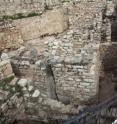 Dr. Eilat Mazar, Hebrew University of Jerusalem archaeologist, points to the tenth century B.C.E. excavations that were uncovered under her direction in the Ophel area adjacent to the Old City of Jerusalem.