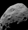 On July 23, 2008, the High Resolution Stereo Camera on board the ESA's Mars Express took the highest-resolution full-disc image yet of the surface of the moon Phobos.

The image data was acquired from a distance of 97 km with a spatial resolution of about 3.7 m/pixel in orbit 5851. These images have surpassed all previous images from other missions in continuous coverage of the illuminated surface at the highest spatial resolution of 3.7 m/pixel.

This image is photometrically enhanced to bring out the features in the less illuminated part.